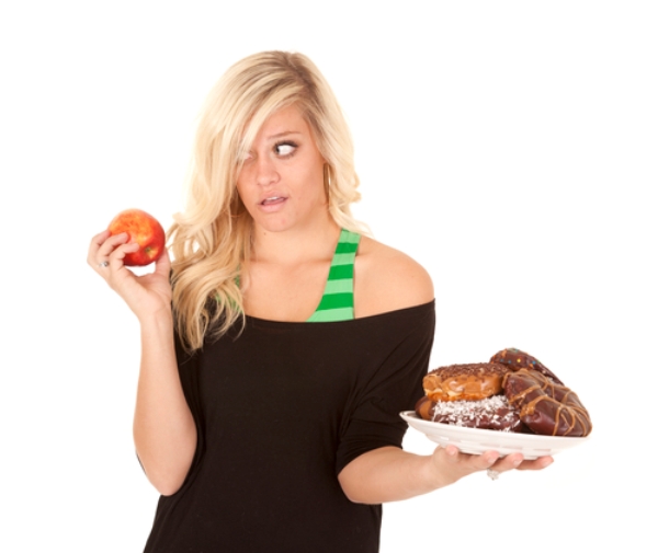 woman with apple want donut