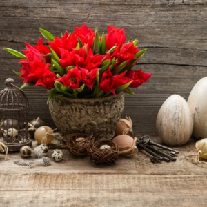 vintage easter decoration with eggs and red tulips